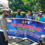 Dengan Spanduk, Sat Lantas Polres Sinjai Sosialisasikan Ops Keselamatan 2021, dan Imbau Prokes