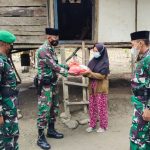 Berkomitmen Ringankan Beban Masyarakat, Yonif 725/Woroagi Bagikan Sembako.